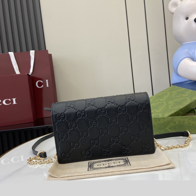 G*u*i satchel bags
